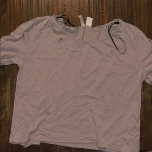 Divided shirt with holes